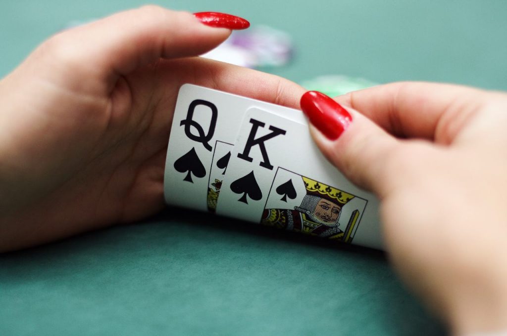 carte suited K-Q of spades